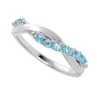 Platinum band with 9 Round Lab Blue Diamond having TCW-.27
