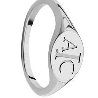 Small Horizontal Oval signet ring (12x9mm) in Titanium, with a Thin style band and a Book Antiqua 3 engraving.