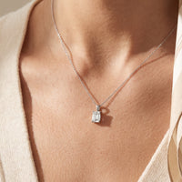 14K White Gold 1/2 CT Natural Diamond Pendant worn by a model