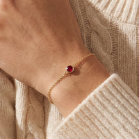 14K Yellow Gold Natural Ruby Bezel-Set Solitaire 6 1/2-7 1/2" Bracelet worn by a model