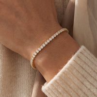 14K Yellow Gold 4 CTW Lab-Grown Diamond Line 7" Bracelet worn by a model