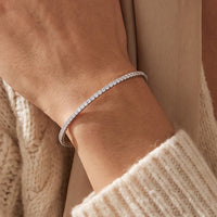 14K White Gold 1 1/2 CTW Lab-Grown Diamond Flexible Bangle 7" Bracelet worn by a model