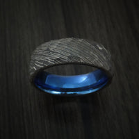 Damascus Steel Men's Ring with Rock Hammer Finish and Anodized Titanium Sleeve Custom Made