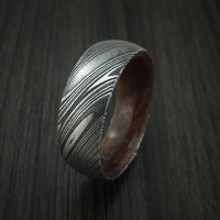 Kuro Damascus Steel Ring with Ancient Kauri Hardwood Sleeve Custom Made Wood Band