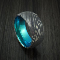 Damascus Steel Ring with Anodized Titanium Interior Sleeve Custom Made