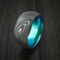Damascus Steel Ring with Anodized Titanium Interior Sleeve Custom Made