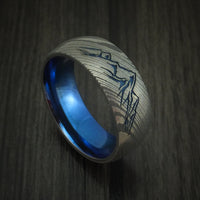 Damascus Steel Ring with Mountain Range and Anodized Titanium Interior Sleeve Custom Made
