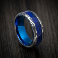Woodgrain Kuro Damascus Steel with Anodized Sleeve and Custom Dinosaur Bone and Stone Inlay