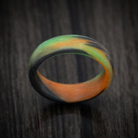 Carbon Fiber Men's Ring with Orange and Green Glow Marbled Design