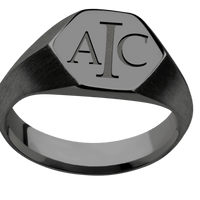 Medium Hexagon signet ring (13.9x12mm) in Zirconium, with a Wide style band and a Book Antiqua 3 engraving.