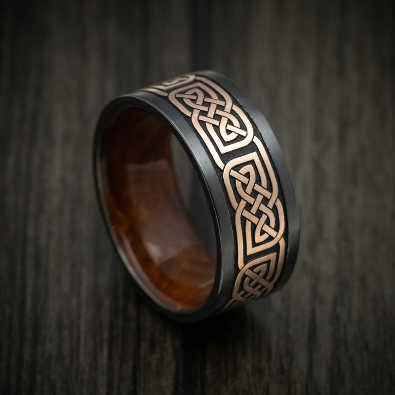 Black Titanium Men's Ring with 14K Gold Celtic Knot and Wood Sleeve Cu | Revolution Jewelry black-titanium-men-s-ring-with-14k-gold-celtic-knot-and-wood-sleeve-cu-revolution-jewelry