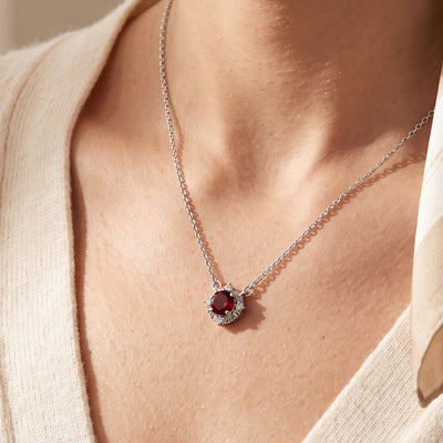 14K White Gold Natural Mozambique Garnet & .04 CTW Natural Diamond Halo-Style 18" Necklace worn by a model