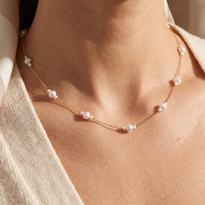 14K Yellow Gold Cultured White Freshwater Pearl 17" Necklace worn by a model