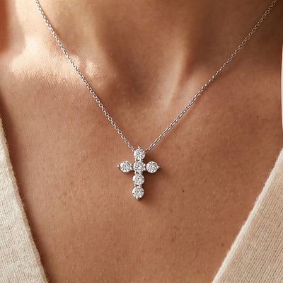 14K White Gold 1/4 CTW Natural Diamond Cross 16-18" Necklace worn by a model