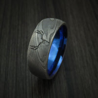 Damascus Steel Band with Anodized Titanium Sleeve and Custom Buck Engraving Hunter's Band