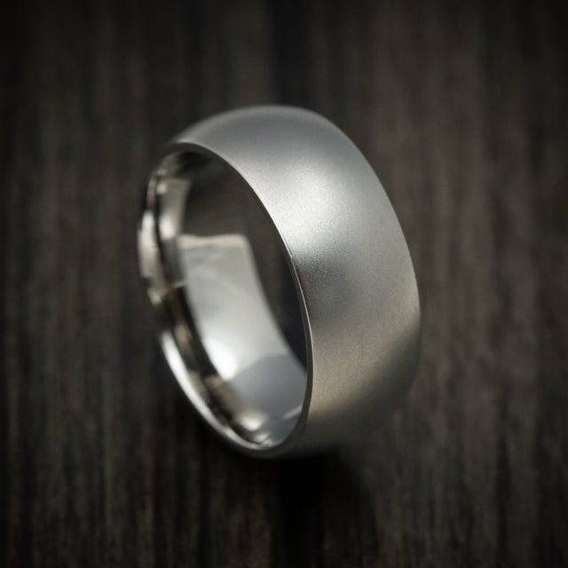Titanium men’s wedding ring with a bead finish on a domed band, custom made