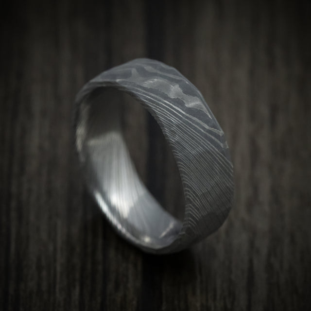 Damascus steel men's wedding ring with a hammer rock finish, custom made