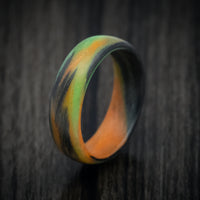 Carbon Fiber Men's Ring with Orange and Green Glow Marbled Design